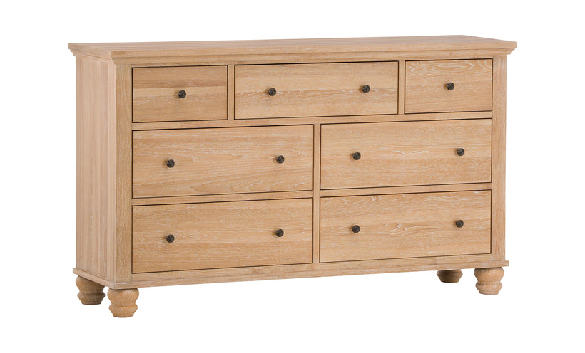 Wooden dresser with multiple drawers on a white background